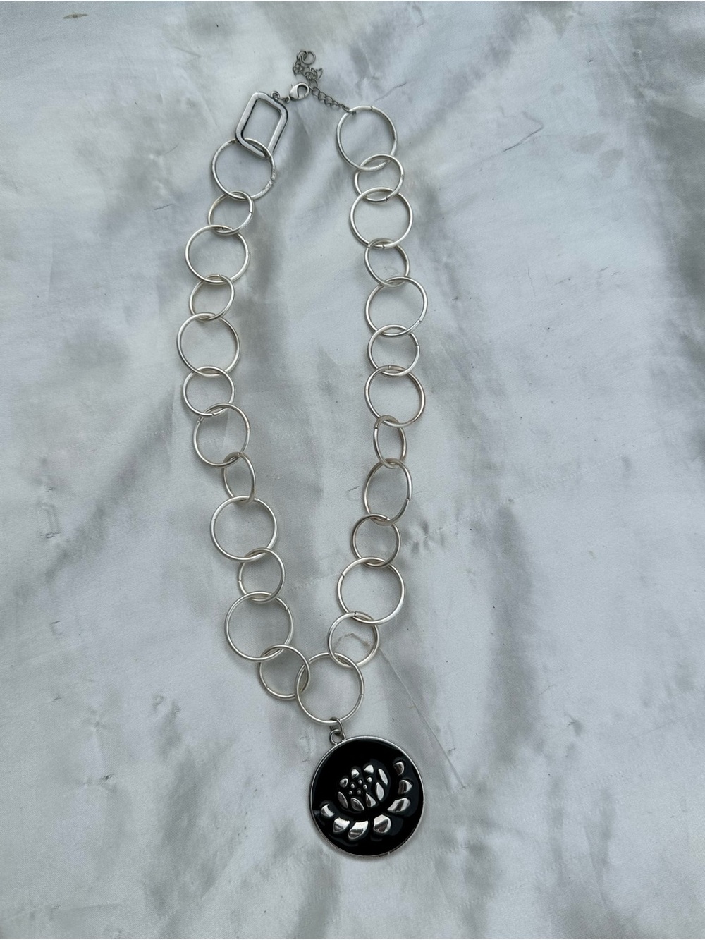 Silver Link Necklace with Black Floral Cutout Pendant